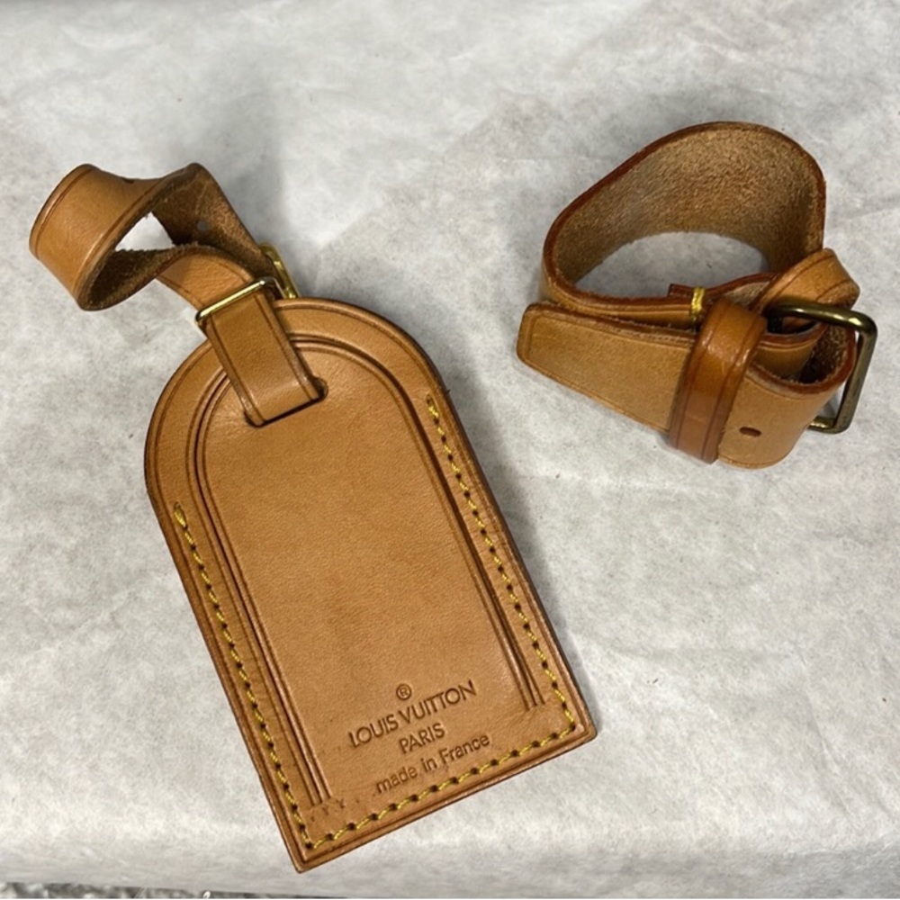 Louis Vuitton leather luggage tag and Poignet set